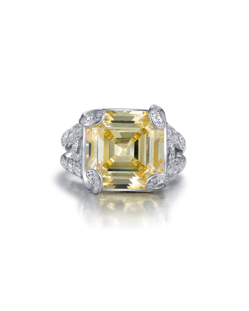 Vista frontal del anillo Bett con piedra amarilla protagonista tallada para reflejar la luz desde cada ángulo.