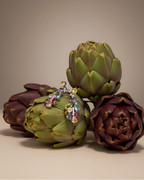 Pendientes sofisticados con piedras en tonos champagne, verde olivine y azul aguamarina.