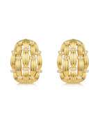 Pendientes Gatsby en plata de ley 925 con baño de oro amarillo de 18kts, adornados con circonitas blancas y cierre de tuerca, de 26 mm de largo.