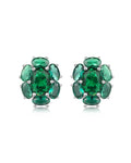 Pendientes MORE con piedra verde esmeralda y acabado elegante en rodio blanco.