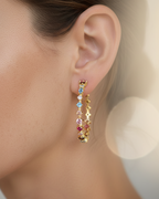 Pendientes Neppi de la colección Wild Akoko de Sibela Studio, joya original inspirada en la lluvia y el movimiento natural.