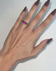 anillo Cyca elaborado en plata de primera ley 925 milésimas, con un elegante baño de oro rosa. El anillo está adornado con piedras en tonos verde y rosa, combinadas en tallas circular y ovalada. Este diseño único fusiona sofisticación y color, ideal para quienes buscan una pieza de joyería moderna y llamativa. Perfecto para destacar en cualquier ocasión especial o para complementar un estilo elegante. Joyería de alta calidad con un acabado impecable.