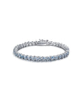 Pulsera MET con piedras azul aguamarina y acabado elegante en rodio.