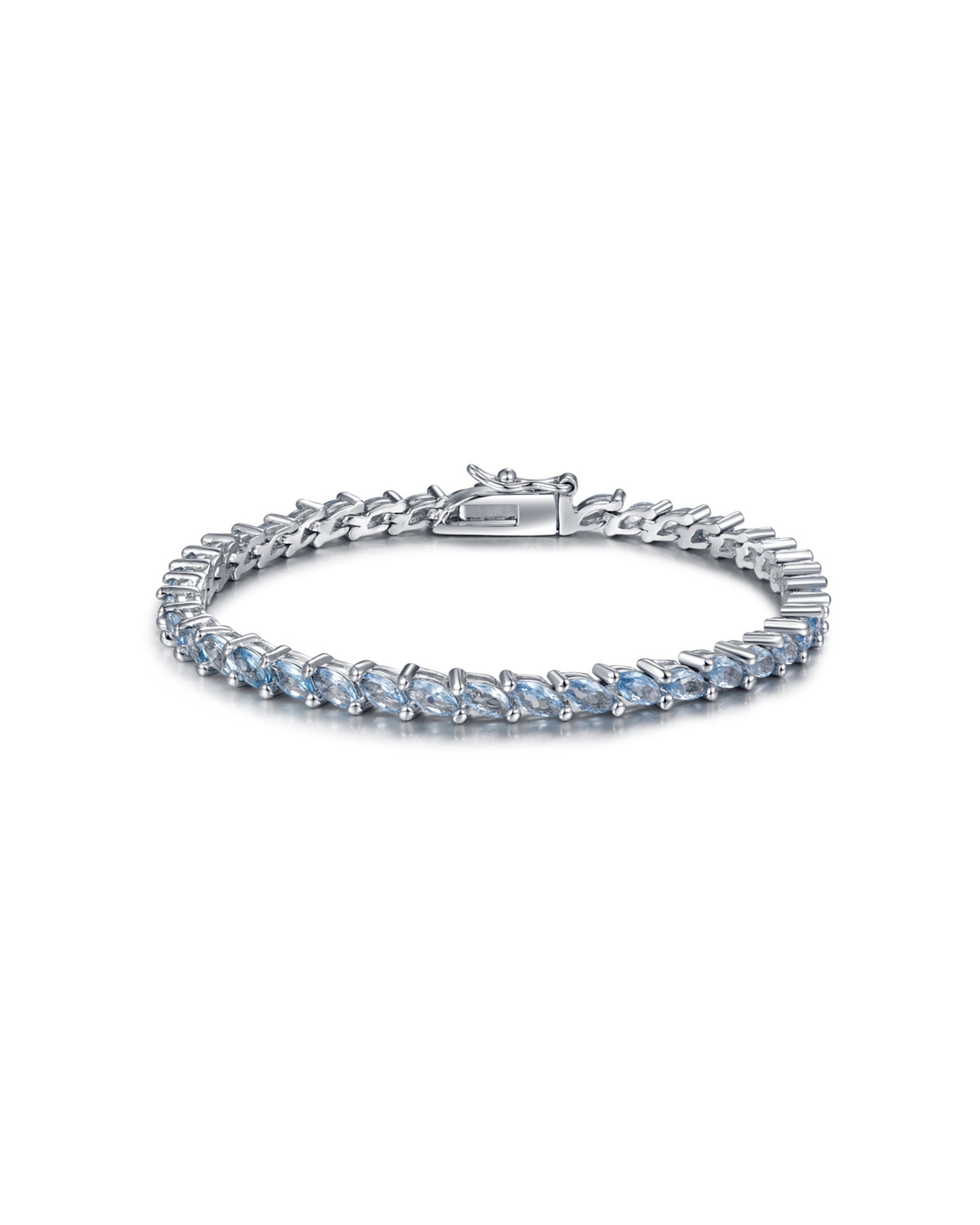Pulsera MET con piedras azul aguamarina y acabado elegante en rodio.