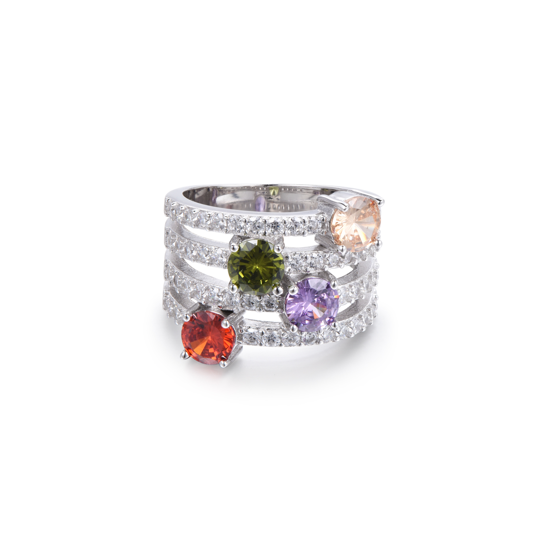 Anillo Perseidas de estilo clásico una base de circonitas blancas en talla diamante hacen que resalten las cuatro gemas preciosas en talla circular las gemas Zircon Champagne, Zircon Peridot, Zircon Violet, Zircon Garnet, hacen de este anillo el complemento perfecto.