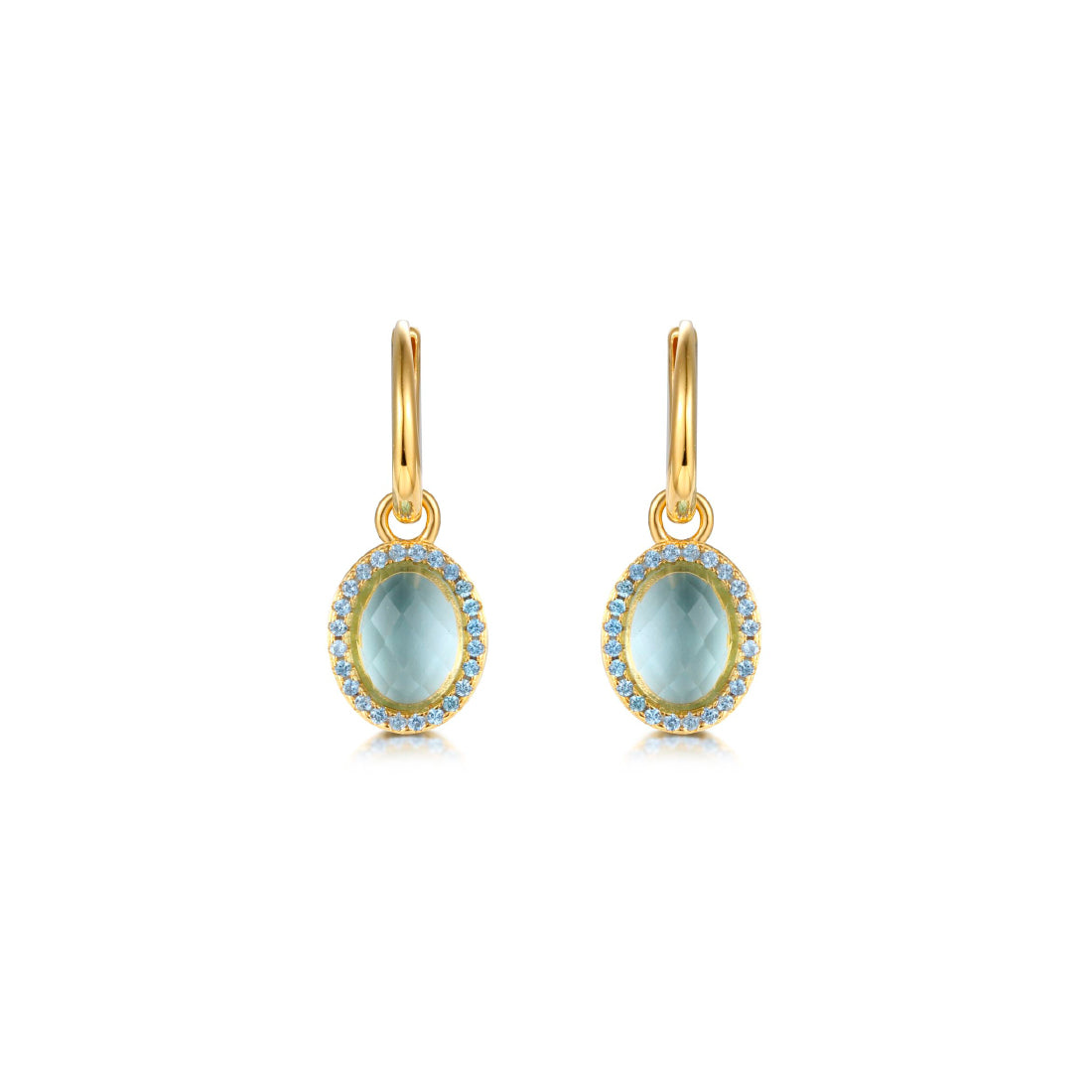 Pendientes Gi con piedra azul aguamarina y acabado en oro amarillo de 18 kt, elegantes y luminosos.