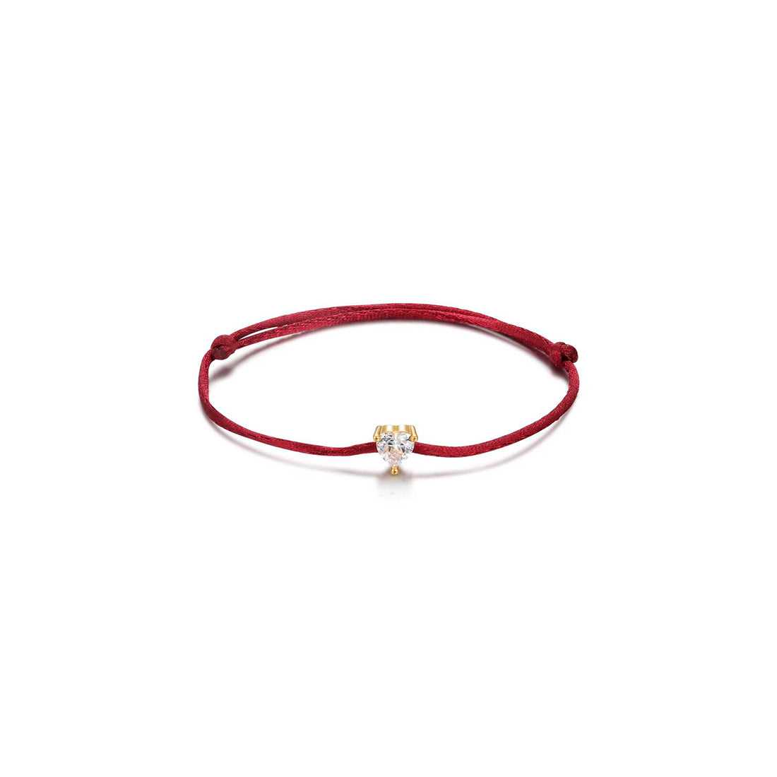 Pulsera Áine con hilo rojo, corazón brillante y acabado en oro amarillo de 18 kt.