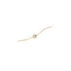 Pulsera Anna de Sibela Studio en oro amarillo de 18 kts con circonita central de 4 mm. Un diseño fino, elegante y luminoso ideal para el día a día.